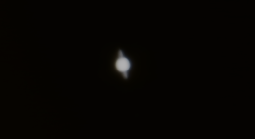 A fuzzy picture of Saturn through a telescope